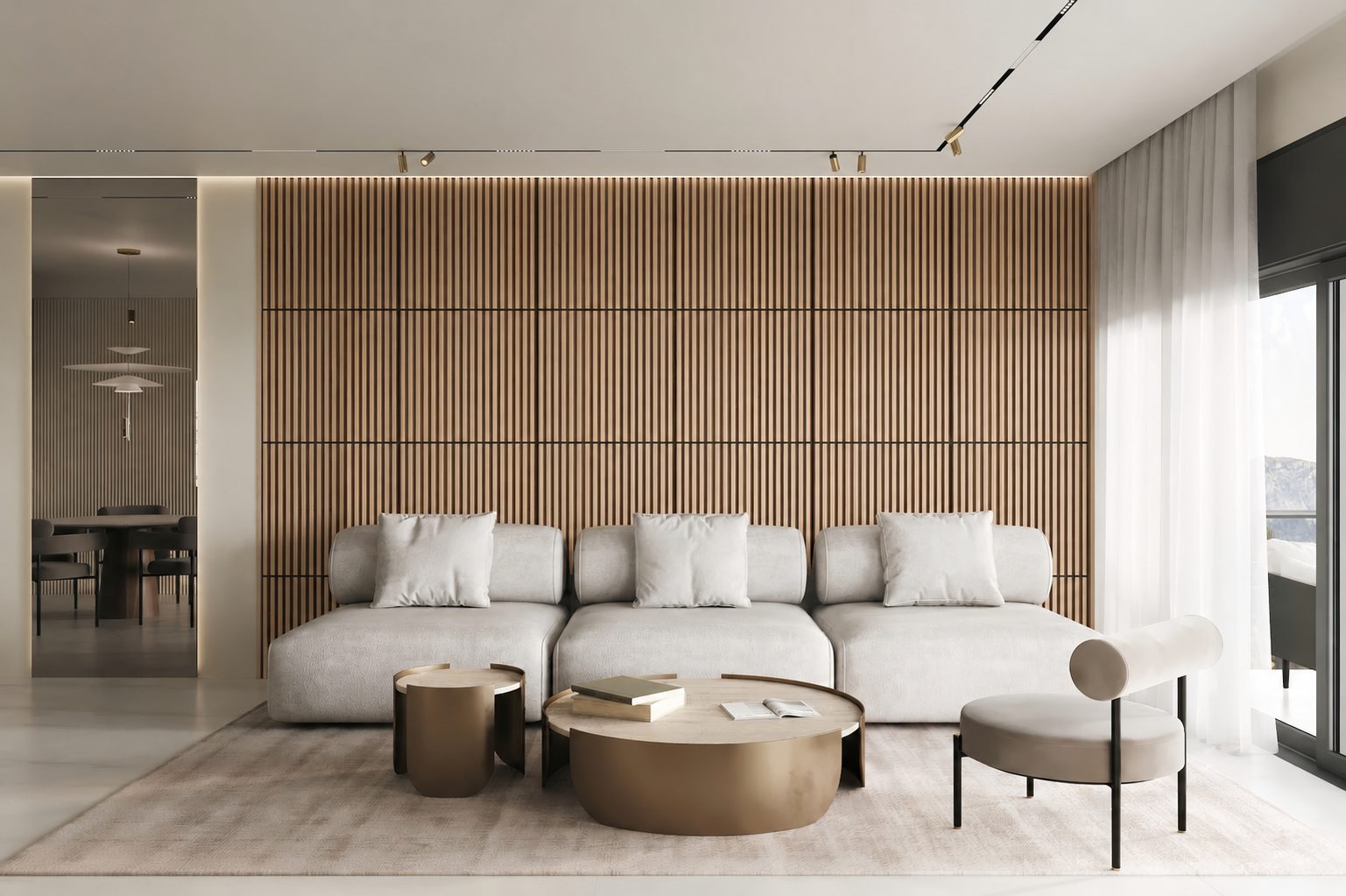 Same living room with a premium oak acoustic slat-wood feature wall behind a wall-mounted television and floating media console